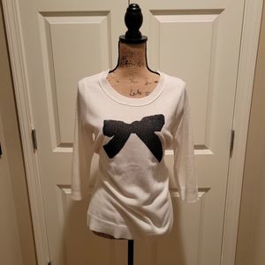 NWT Woman's 3/4 sleeve lite material, decorative bow has glittery specs